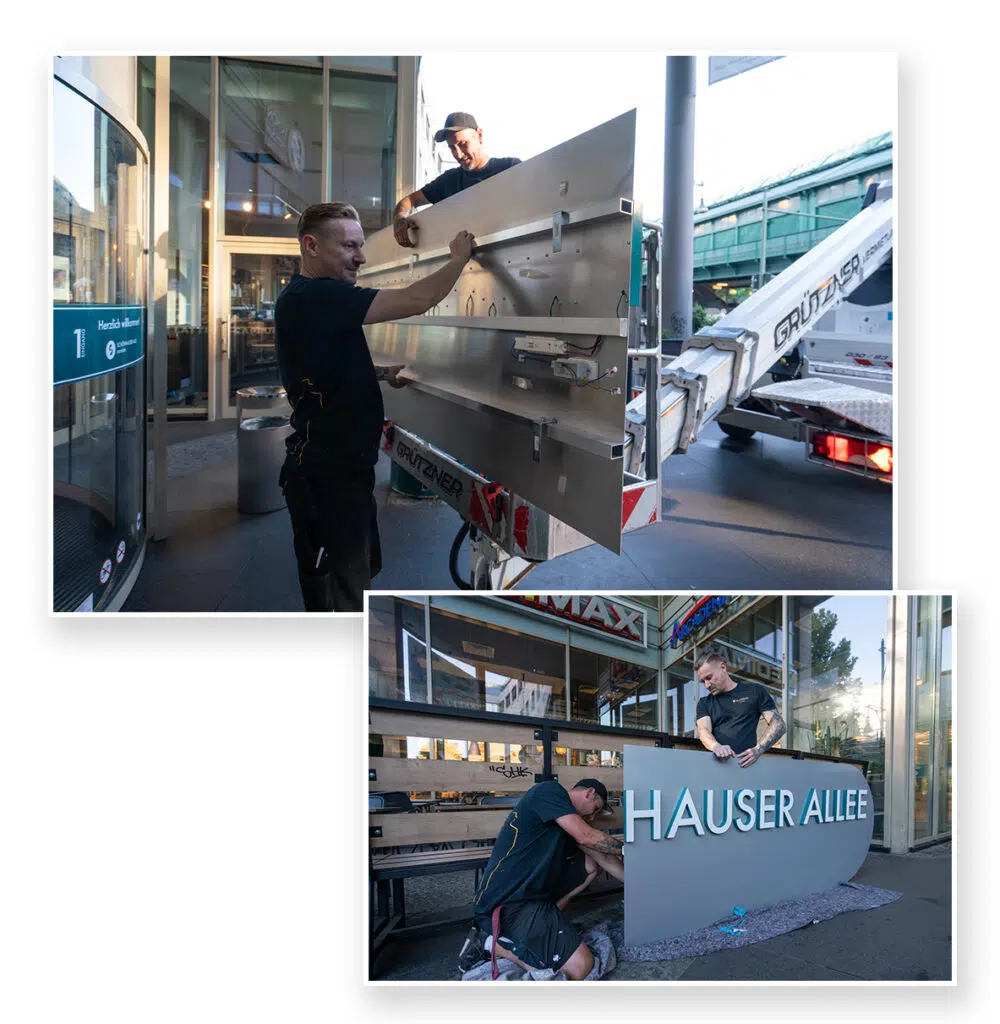 Zwei Fotos zeigen Monteure bei der Montage einer Leuchtreklame mit der Aufschrift „Hauser Allee“. Sie bereiten das Metallelement vor und überprüfen die Verkabelung, bevor sie das Schild am Gebäude installieren. Im Hintergrund eine urbane Umgebung.